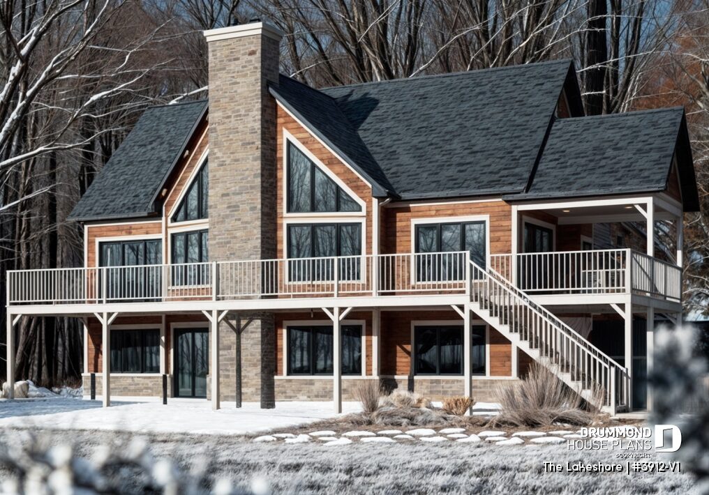 Winter view of the LAKESHORE (#3912-V1) lakefront cottage plan with finished walkout basement, cathedral windows and panoramic terrace