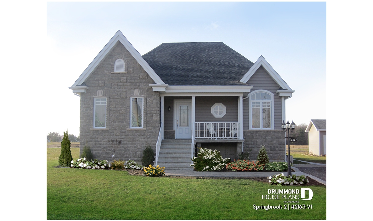 Springbrook 2 (#2163-V1) country house plan with 2 bedrooms, European-inspired exterior, bright open-concept layout, and warm timeless charm.