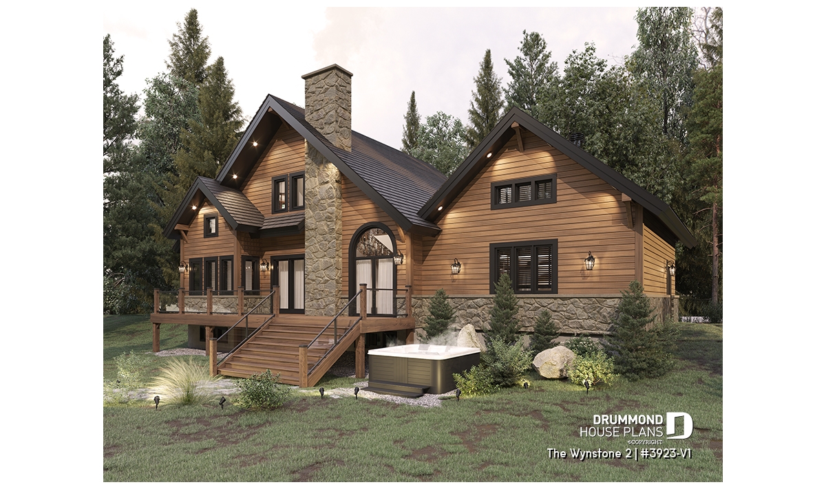 Rear view of rustic chalet house plan with deck, stone chimney and outdoor living space