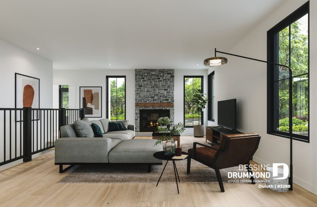 Magnifique salon avec un foyer en brique pour donner un look chaleureux.