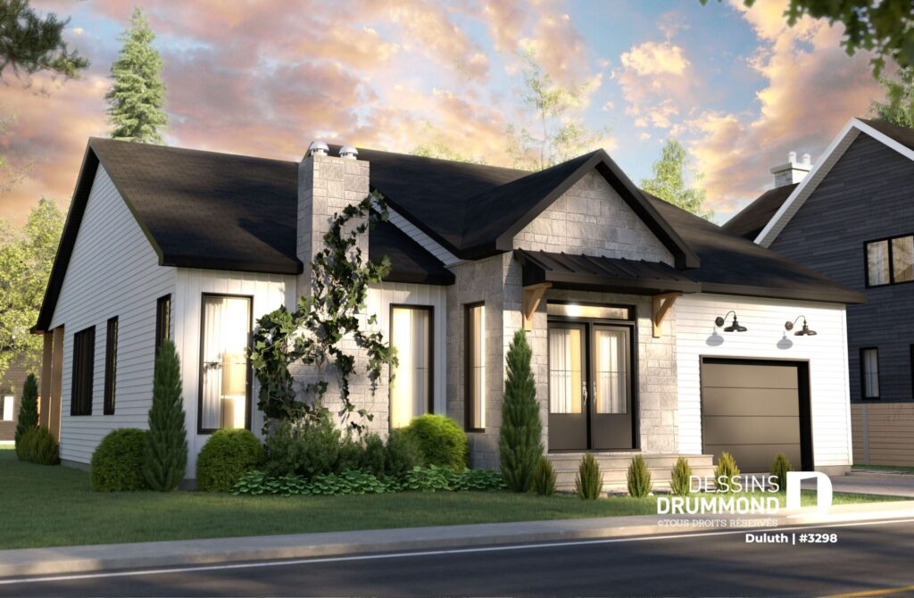 Jolie maison Craftsman avec un toit noir, de la brique en facade et un revêtement de style Farmhouse moderne.