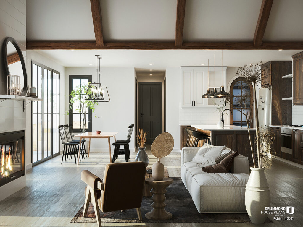 Family room photo with cathedral ceiling of Modern Ranch house plan Robin