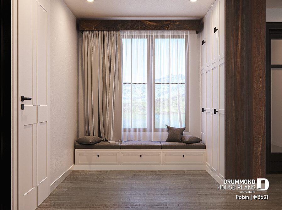 Spacious mudroom with built-in storage cabinets, window bench and custom organization in the Robin (#3621) one-story modern ranch house plan.