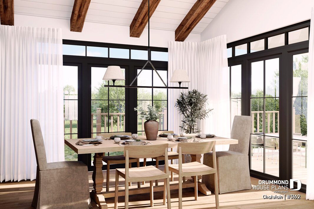 Bright dining room in a single-story house with large windows and outdoor access – Chatelain (#3162)
