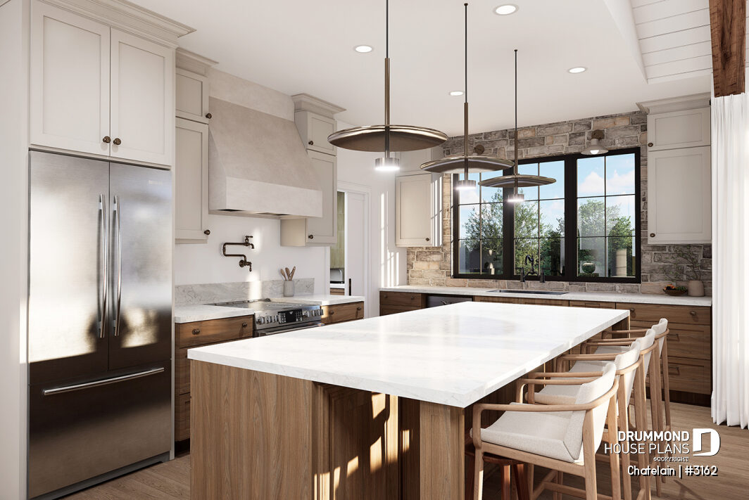 Bright single-story house kitchen with large island, white cabinetry and natural light – Chatelain (#3162)