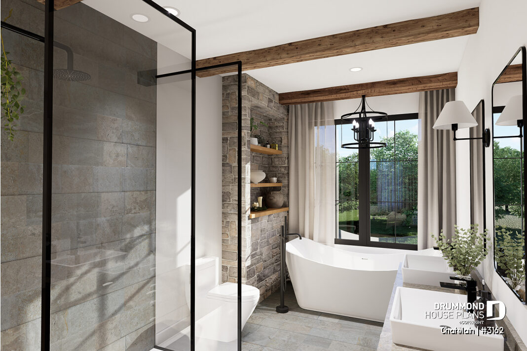 Modern primary bathroom in a bright single-story house with freestanding tub, glass shower and large window – Chatelain (#3162)