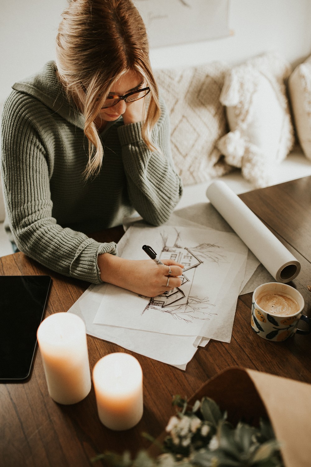 Home designer creating custom house plans online with a personalized approach and attention to detail