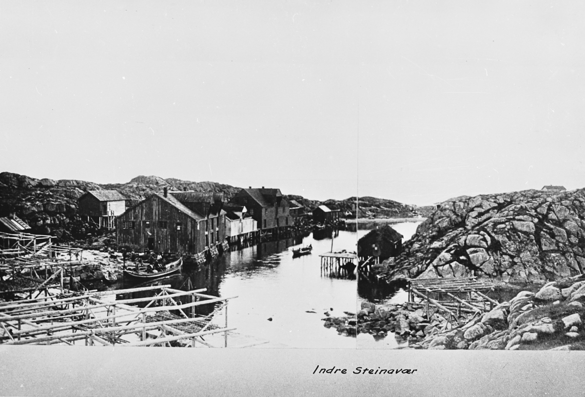 Traditional dark wood buildings in the fishing village of Steinavær, Norway