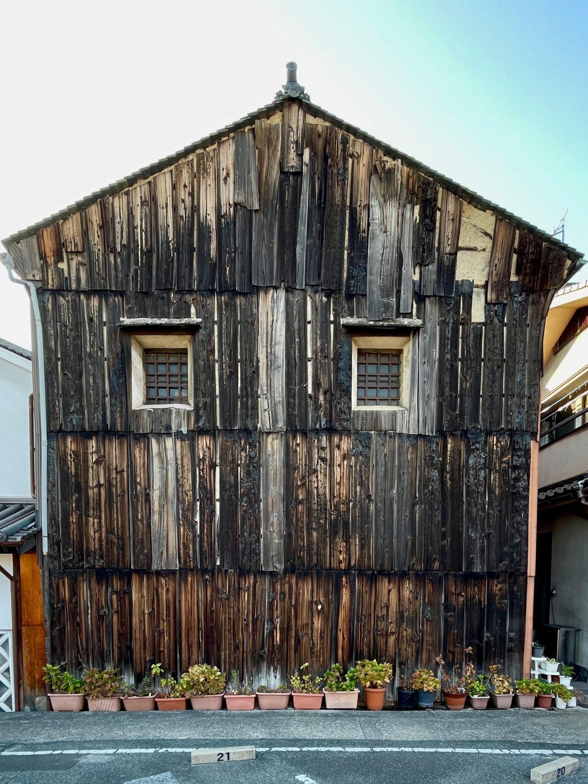 Traditional dark yakisugi wood exterior in Saga Toriimoto near Kyoto, Japan